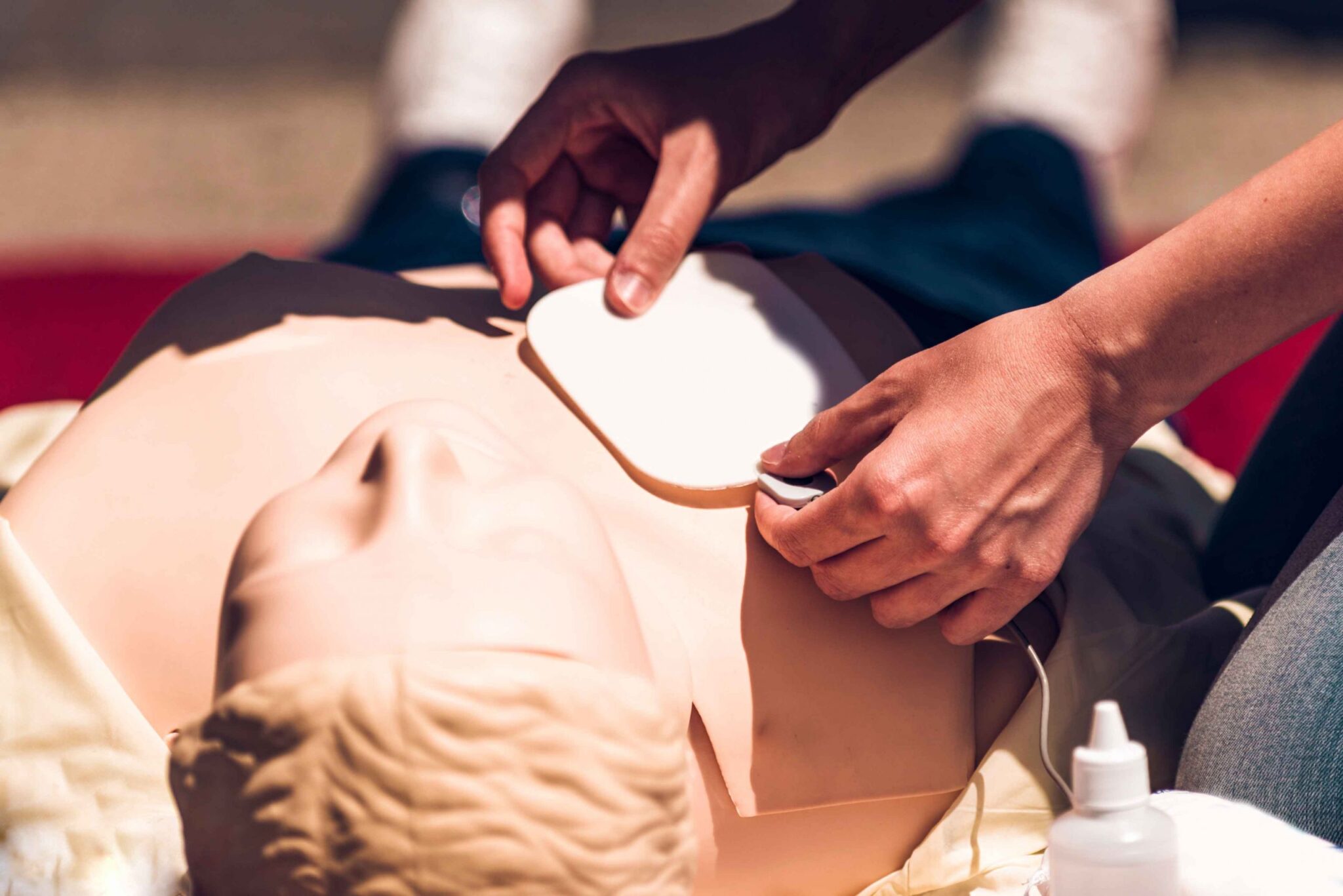 AED demonstration on a training dummy